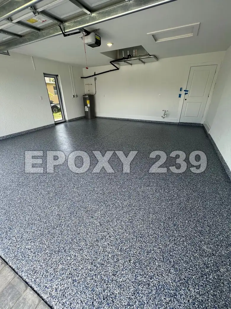 Garage with a glossy Orbit flake epoxy floor