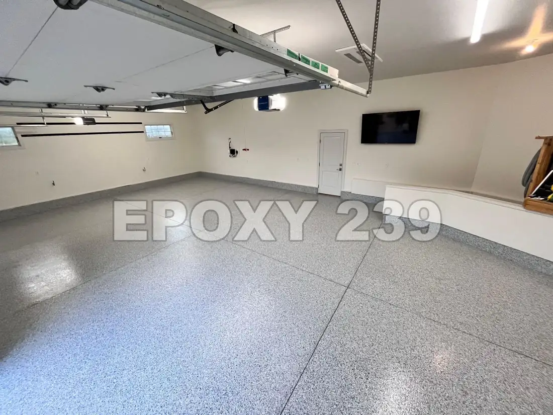Large bright garage with a glossy Tidal Wave flake epoxy floor